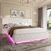 A bedroom scene featuring a white upholstered bed with LED lighting. Náhled obrázku produktu
