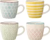 Four patterned ceramic mugs are arranged in a 2x2 grid against a white background. Produktbild-Vorschau