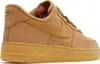 A side view of a tan Nike Air Force 1 Low sneaker. Náhled obrázku produktu