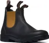 A single black leather boot with tan elastic side panels and brown pull tabs is shown against a white background. Voir les images du produit