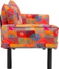 A close-up side view of a colorful patchwork sofa. Produktbild-Vorschau