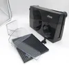 A black electric slicer with its accessories laid out on a white background. Produktbild-Vorschau