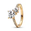 A close-up studio shot of a gold Pandora ring with two heart-shaped clear stones and small clear stones along the band. Produktbild-Vorschau