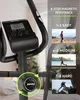 Close-up of an exercise bike's console and resistance knob, with overlaid text and images illustrating resistance levels. Produktbild-Vorschau