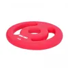 A red weight plate with handles on a white background. Produktbild-Vorschau