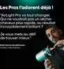 A man is holding a hairdryer, with text overlaying the image. Produktbild-Vorschau