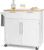 A white kitchen cart with a wooden countertop is shown against a white background. It features two drawers and two cabinet doors, with a towel rack on the side. Two wine glasses and a decanter with liquid are on the countertop, along with a plate with toas