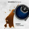 A robot vacuum cleaner is cleaning a spill on a white surface. Anteprima dell’immagine prodotto