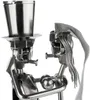 A close-up of a metal sculpture of a bride and groom. Anteprima dell’immagine prodotto