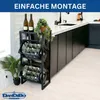 A kitchen setting with a wine rack filled with bottles, plants, and kitchen cabinets. Anteprima dell’immagine prodotto