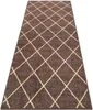 A brown rug with a diamond pattern on a white background. Produktbild-Vorschau