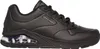 A black Skechers sneaker with a clear air bubble in the sole, shown from the side against a white background. Anteprima dell’immagine prodotto