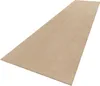 A long, narrow beige rug is shown from a diagonal, slightly elevated angle against a white background. Produktbild-Vorschau