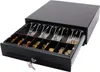 A black cash drawer with compartments for coins and bills, and a key in the lock. Anteprima dell’immagine prodotto