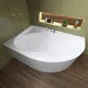 A modern bathroom with a white corner bathtub, green tiled walls, and a wooden floor. Produktbild-Vorschau