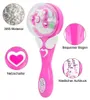 Rosa Haarflechtwerkzeug mit transparenter Kuppel, die Fadenspulen zeigt, mit Herz- und Flügeldetails Podgląd zdjęcia produktu