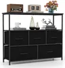 A black fabric dresser with a metal frame and wooden top, displaying various decorative items on its shelves. Anteprima dell’immagine prodotto