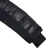 Close-up of a black jacket sleeve with water droplets. Produktbild-Vorschau