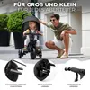 A father and child are on a tricycle outdoors. Náhled obrázku produktu