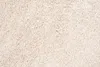 A close-up, top-down view of a beige carpet. Náhľad obrázku produktu