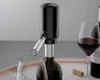 An electric wine dispenser is shown in use, pouring wine into a glass. Anteprima dell’immagine prodotto