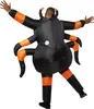 A person wearing an inflatable spider costume. Produktbild-Vorschau