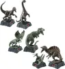 A collection of dinosaur figurines on display. Podgląd zdjęcia produktu