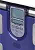 Close-up of the control panel and display of a blue Omron body composition scale. Podgląd zdjęcia produktu