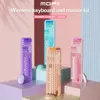 Four colorful wireless keyboard and mouse sets are displayed on a multi-tiered platform against a pastel background. Produktbild-Vorschau