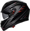 A black motorcycle helmet with red and gray accents, shown from a side-diagonal angle against a white background. Podgląd zdjęcia produktu