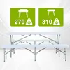 A white plastic folding table and bench set is shown with marketing graphics indicating weight capacities. Náhľad obrázku produktu