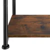 A close-up view of a shelf on a table with black metal legs. Produktbild-Vorschau