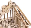 A close-up view of a wooden marble run construction kit with several silver marbles on its tracks. Podgląd zdjęcia produktu