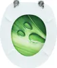 A white toilet seat with a green leaf and water drop design. Náhľad obrázku produktu