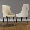 Two dining chairs are shown from different angles against a plain gray background. Podgląd zdjęcia produktu
