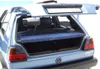 Close-up view of the open trunk of a blue metallic Volkswagen Golf 2 model car. Produktbild-Vorschau