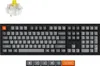 A mechanical keyboard and a single keyboard switch are displayed against a white background. Produktbild-Vorschau
