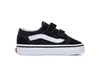 A single black and white Vans Old Skool V sneaker for children is shown against a white background. Voir les images du produit
