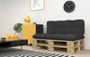 A living room scene with a pallet sofa, coffee table, and a cabinet. Voir les images du produit