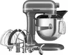 A silver KitchenAid stand mixer with various attachments. Podgląd zdjęcia produktu