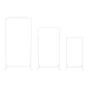 Three white metal stands of varying heights are arranged on a white background. Voir les images du produit