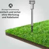 A solar garden stake is shown planted in a patch of grass, with text overlay describing its features. Produktbild-Vorschau