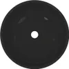 A top-down view of a black ceramic sink with a drain hole in the center. Podgląd zdjęcia produktu