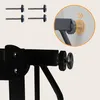 Close-up view of a baby gate's mounting hardware and an inset showing how it attaches to a wall. Anteprima dell’immagine prodotto