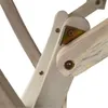 A close-up view of the wooden joints and metal hardware of a folding table. Produktbild-Vorschau