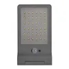 A gray LED solar outdoor light with a motion sensor. Voir les images du produit