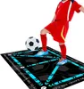 A child in a soccer uniform is standing on a soccer training mat with a soccer ball. Podgląd zdjęcia produktu
