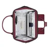 An open backpack with items inside. Produktbild-Vorschau