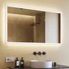 A bathroom vanity with a sink, faucet, and a lit mirror. Náhled obrázku produktu