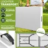 A person is holding a folded white plastic table outdoors in a grassy area. The image includes marketing text and icons. Anteprima dell’immagine prodotto